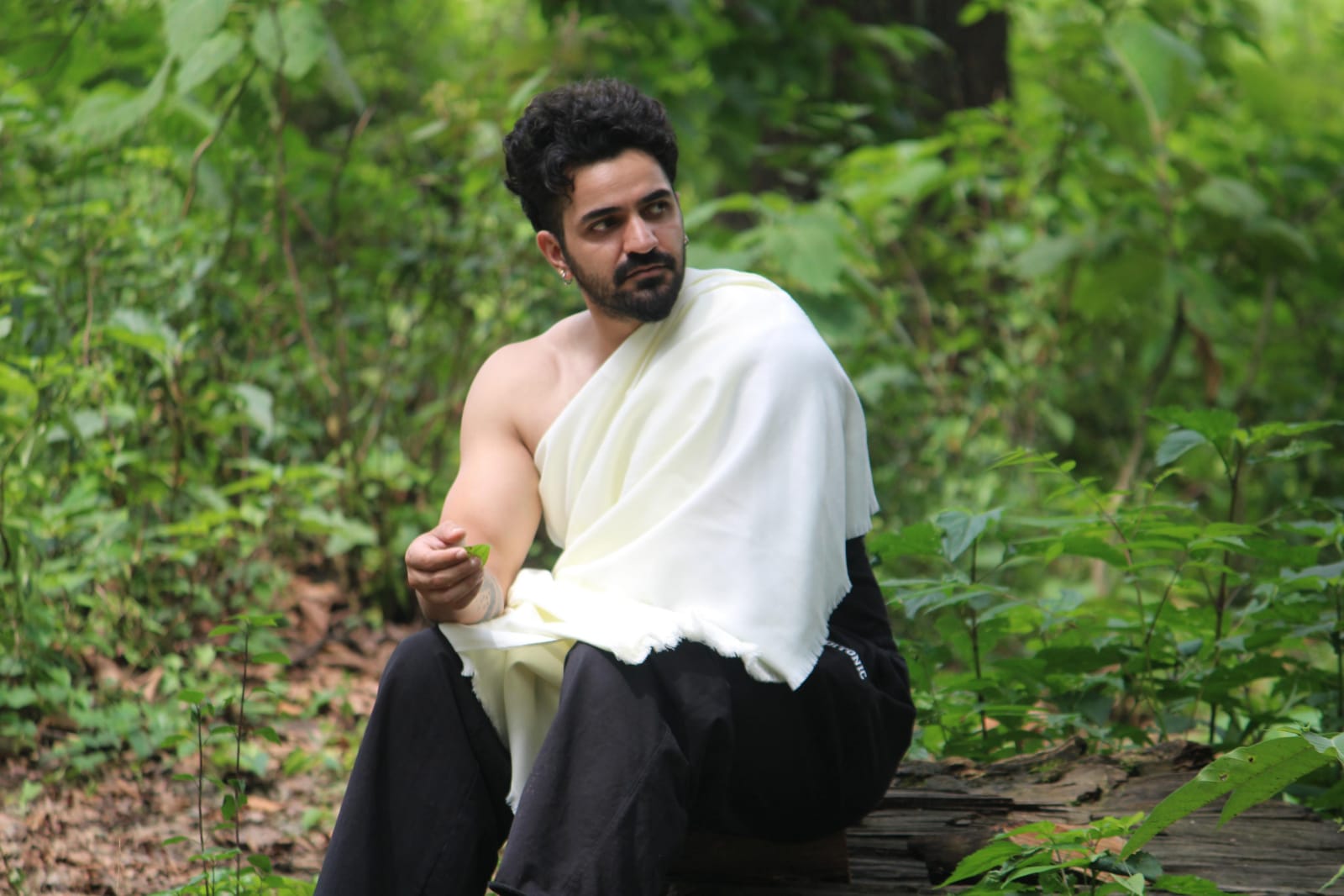 Aditya Chamoli seated outdoors, demonstrating relaxed posture
